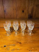 Front view showing all 8 Waterford Colleen cordial glasses