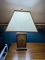 Full view of lamp with shade on table