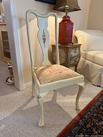 Full view of painted accent chair