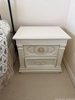 front view showing drawers and hardware