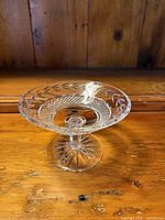 Oblique view of Waterford crystal pedestal candy dish showing leaf and diamond cuts