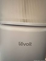 Close-up of Levoit logo on filter body