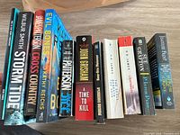Spines of all ten paperback novels