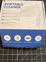 Retail box labeled Portable Cleaner showing features