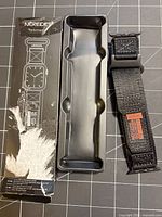 Retail box, inner tray, and band showing brand and design