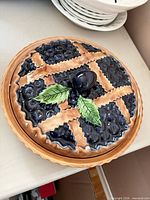Top view of covered pie dish showing decorative lattice lid