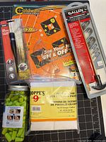 All six packaged items grouped on work surface