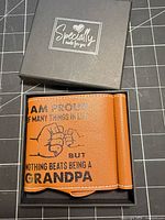 Sleeve folded inside gift box showing printed message