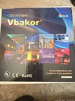Front of Vbakor LED strip lights retail box showing brand and RGB marking