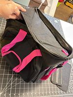 Overall view of Wincent range bag, pink straps, main compartment open