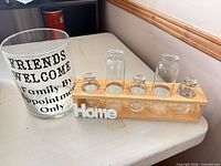 Full set: quote vase, wooden holder, five bud vases