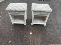 Front view of both matching wicker end tables showing drawer and shelf