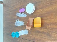 All items in lot laid out on table for overview