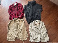 Four garments laid flat: plaid shirt, grey sweater, tan utility jacket, beige blazer