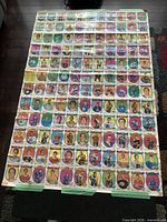 Full view of entire uncut sheet showing all 132 cards
