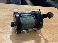 Overall view of Ambassadeur Seven reel right side showing spool and handle