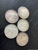 Obverse view of all five 1967 quarters