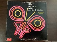 Front sleeve with butterfly artwork and title