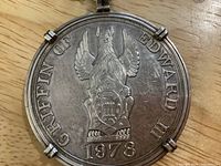 Obverse of medallion showing Griffin of Edward III and date 1978
