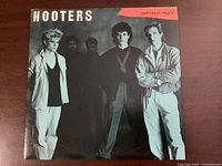 Front sleeve showing band photo and title