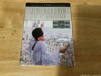 Front view of sealed Jimi Hendrix Live at Woodstock 2-disc set