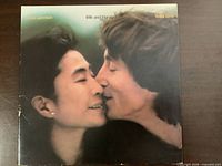 Front cover of Milk and Honey LP showing artists