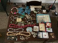 Full table view of assorted jewelry pieces