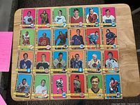 Overall view of 24 hockey cards laid out in four rows of six