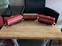 front view of all three Marx train cars on table