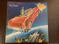 Front cover artwork of Red Rider "Don't Fight It" LP