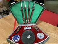 Full set in open case showing all 11 pieces