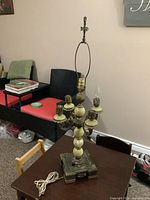 full view of lamp showing multi-light arms, onyx column and base