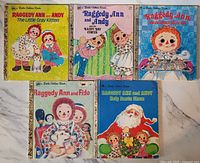 Front covers of five Raggedy Ann themed Little Golden Books arranged side-by-side