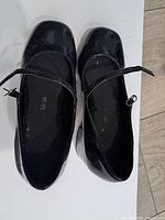 Top view showing both shoes and size marking 5.5