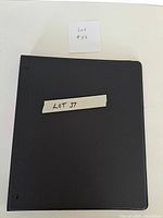 Closed black binder front cover