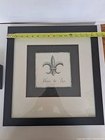 Framed print with horizontal tape measure