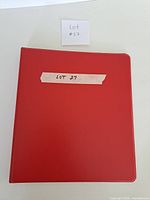 Closed red binder front cover
