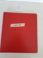 Closed red binder front cover
