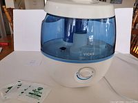 Front view of Vicks humidifier with VapoPads packets