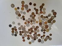 Scattered view showing bulk of mixed world coins