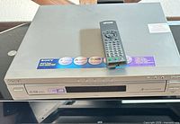 Front and top view of Sony DVP-NC675P DVD/CD player with remote