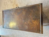 Top view of wooden chest showing wear on lid surface