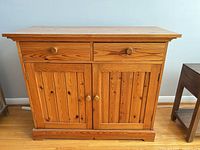 Front view of wooden hutch closed