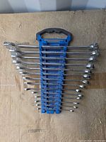 Front view of full set showing 15 wrenches in organizer