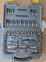 Full view of open case with all 56 pieces