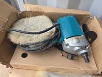 Polisher with pad and cord in box
