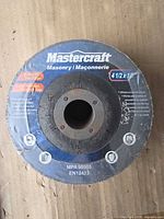 Front label of Mastercraft masonry grinding disc showing size and branding