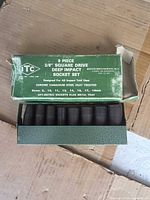 Box and tray with sockets visible