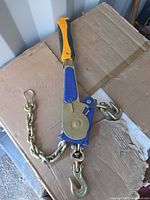 Full view of Mytee chain ratchet binder with chain and hooks