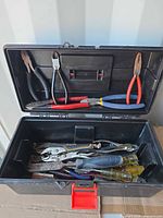 Toolbox exterior and upper tray tools visible